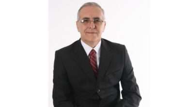 Secretário Municipal de Segurança Jorge Martins Salgado de terno preto, camisa branca e gravata na cor vinho